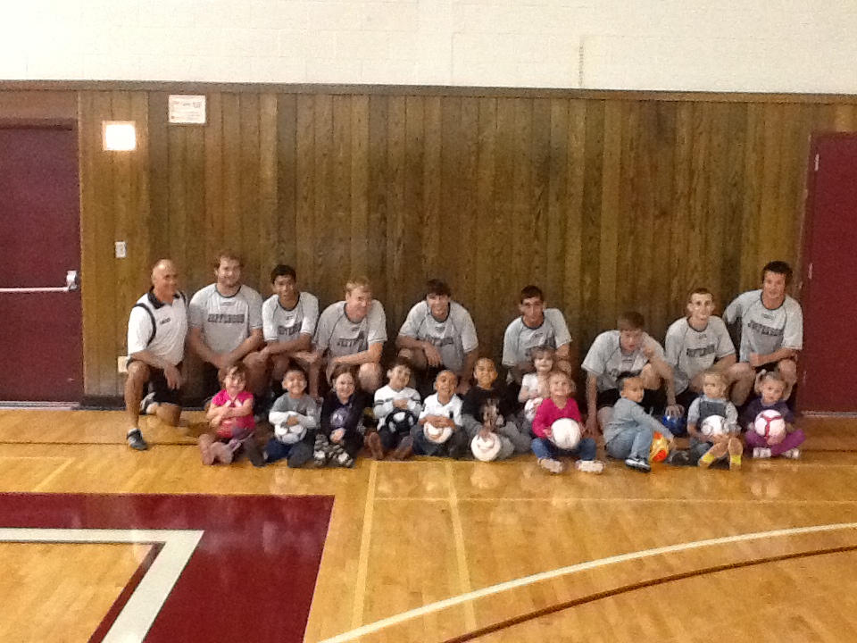 Men's Soccer Lends a Hand Helping Youth